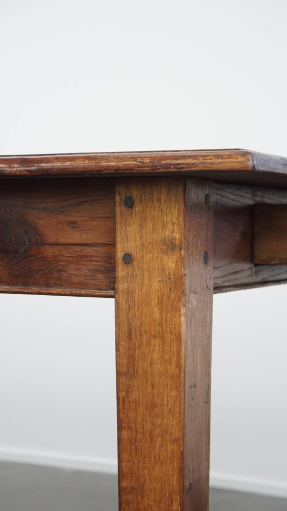 Image 1 of Table de salle à manger ancienne en chêne du début des années 1900 avec plateau rabattable d'un côté