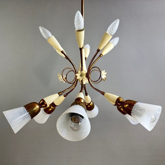 Image 1 of Chandelier twelve-light with Murano glass "Reticello" lampshades. Gilt brass and aluminum frame. Italy, 1950s.