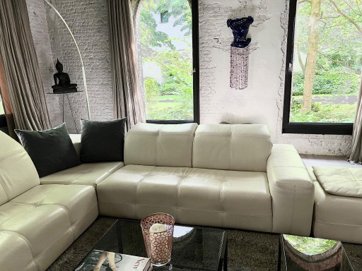 SOFÁ ESQUINERO DE CUERO NATUZZI