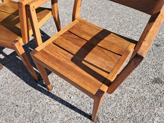 Image 1 of 6 Traditional Teak stacking chairs with armrests