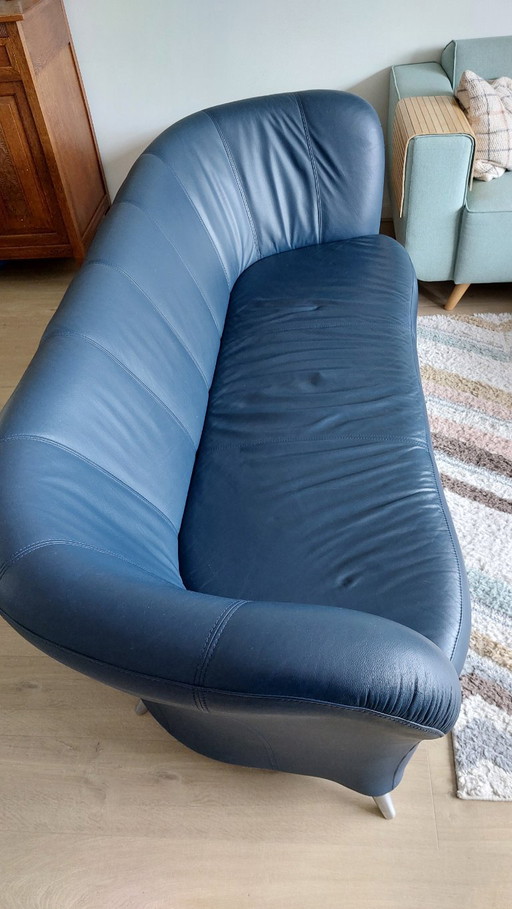 Dark blue Leolux three-seater sofa