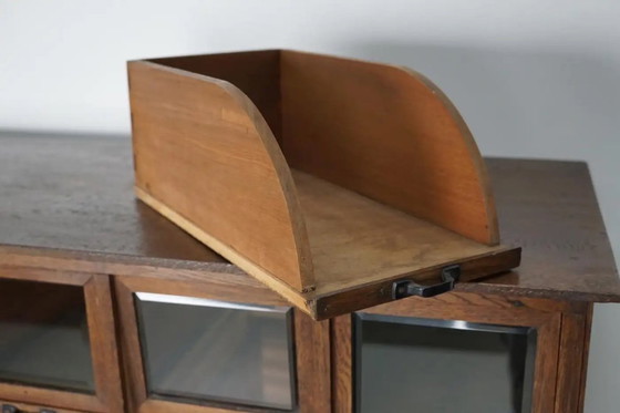 Image 1 of Mobiletto antico tedesco in rovere per merceria, anni '20/'30