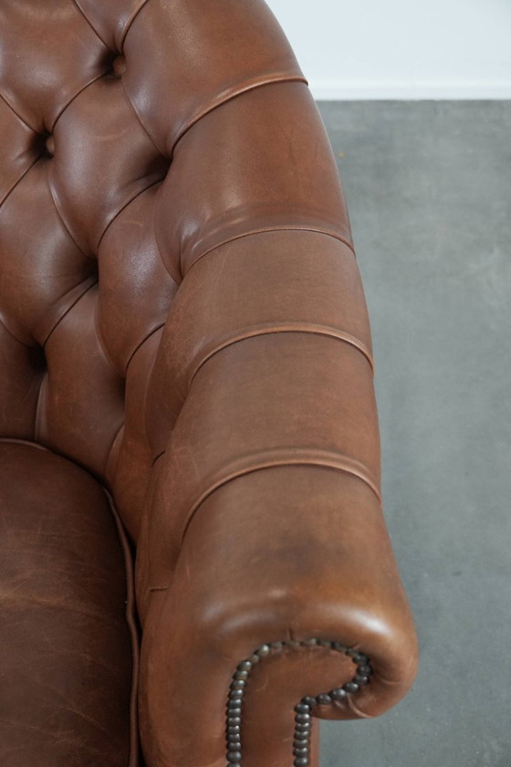 Image 1 of Poltrona Chesterfield in pelle in stile inglese con borchie decorative