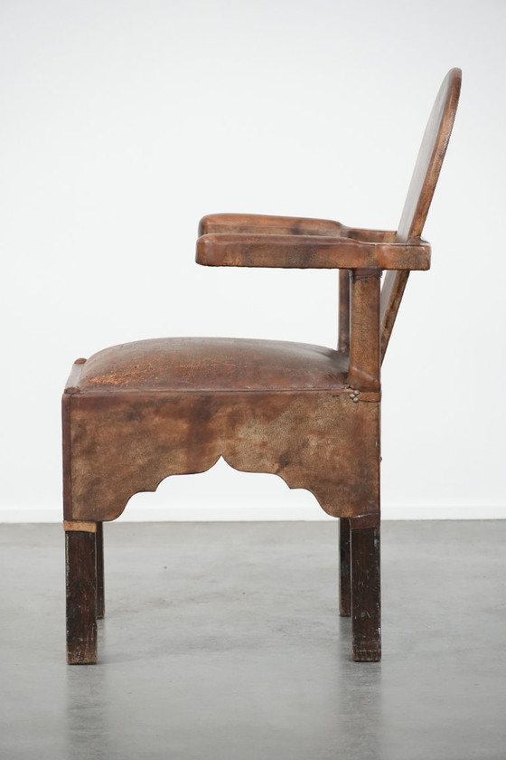 Image 1 of Unieke antieke schapenleren stoel/ armchair met een bijzonder Noord-Afrikaans design