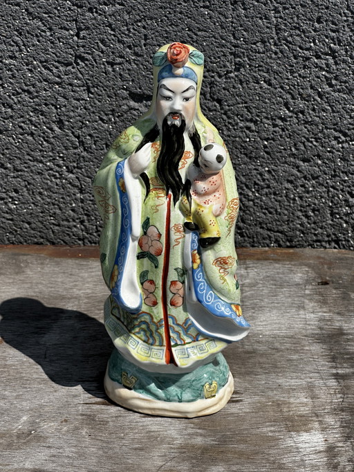 Pink Family Enameled Biscuit Figurine - Fu-Xing carrying a Child H 27 cm