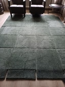 Cesta de casa con diseño de alfombra