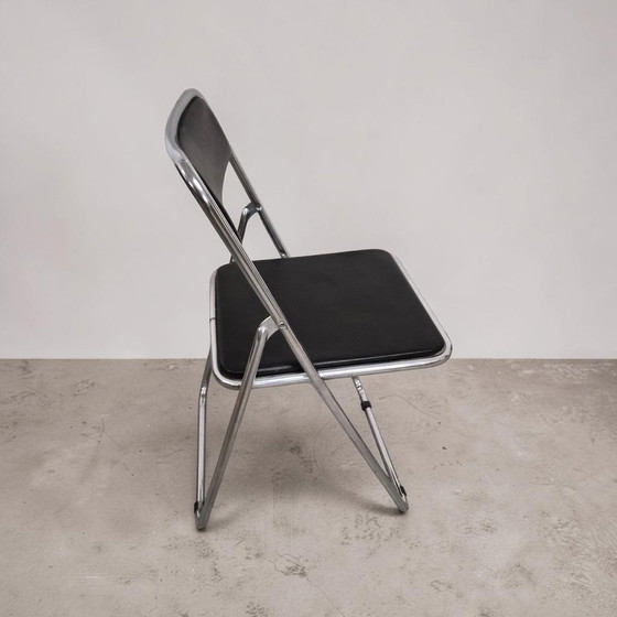 Image 1 of Set van 4 opklapbare stoelen in chroom- en leerstijl uit het midden van de 20e eeuw, Italië, jaren 70.