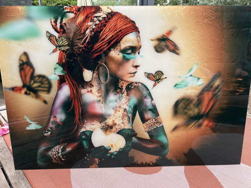 Cobra art: woman with butterfly
