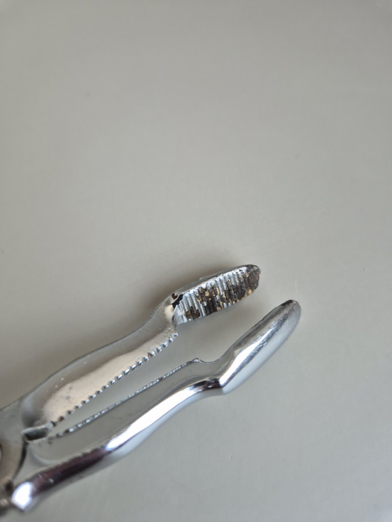 Image 1 of Pinze da portata vintage in metallo cromato - stile barocco decorativo