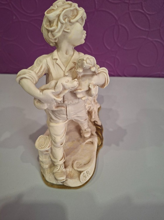 Image 1 of Giuseppe Armani Florenz Figur Junge mit Hunden