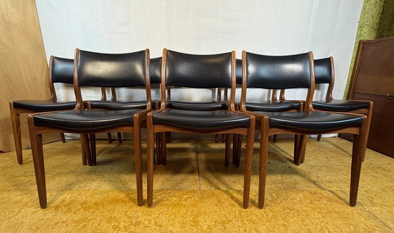 Image 1 of Mid-Century Retro Set of 8 Dining Chairs by Johannes Andersen for Uldum Møbelfabrik 1960  Elevate your dining space with this st