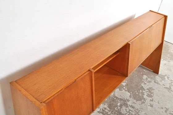 Mid-century sideboard with slanted front, 1950s – Wood (photo 9 of 13)