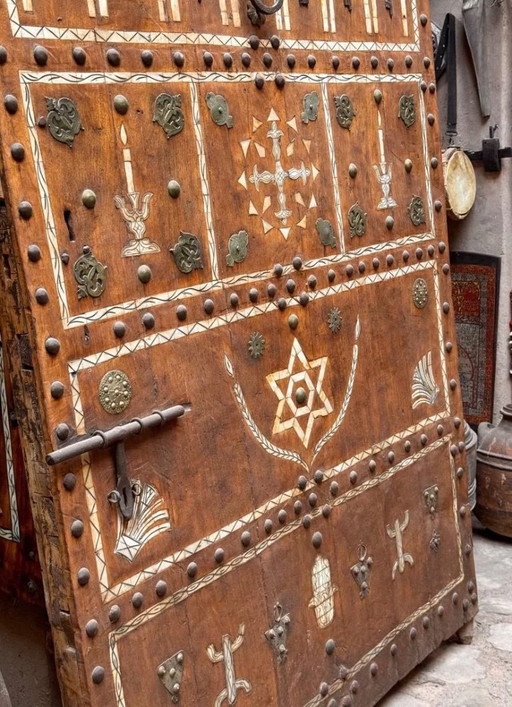 Berber heritage: antique door decorated with camel bones