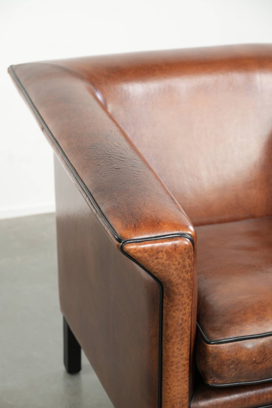Image 1 of Strakke schapenleren Art Deco design armchair/ fauteuil met zwarte biezen en een prachtige warme kleur