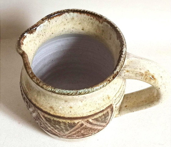 Image 1 of Stoneware pitcher stamped Giraud. Height 18.5 cm