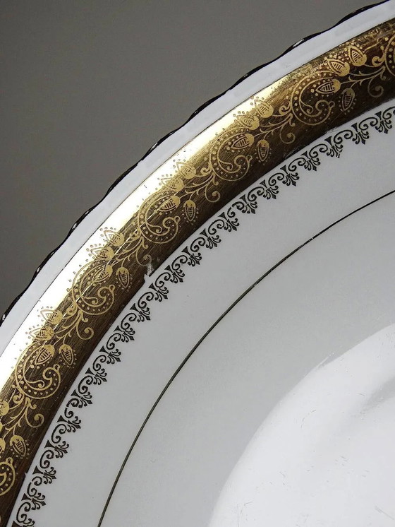 Vintage deep plate in gilded Limoges porcelain, ADP L Royal – Crockery, Gold (photo 5 of 12)