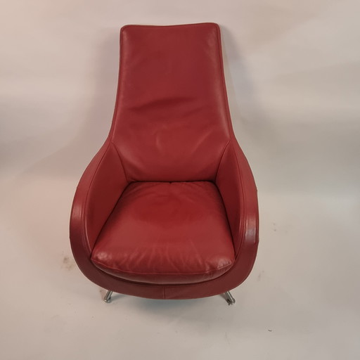 Poltrona girevole in pelle rossa Rolf Benz