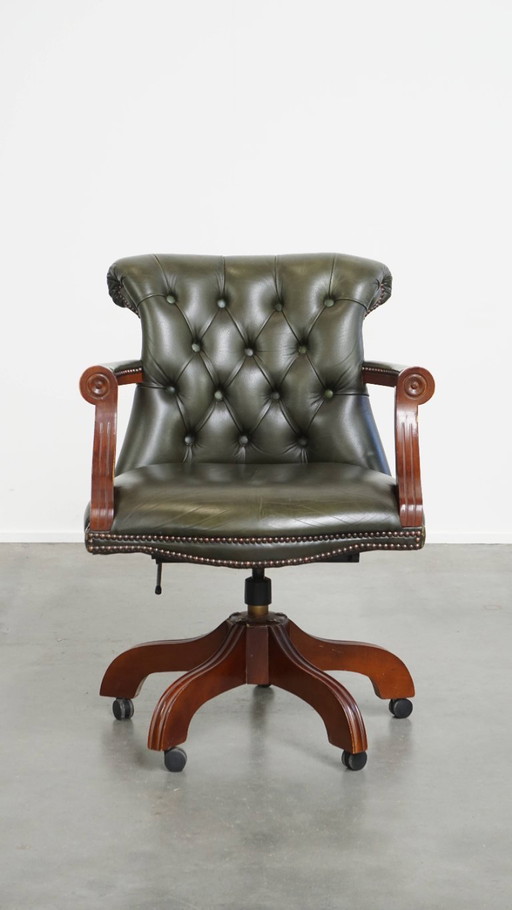 Green cowhide leather chesterfield office chair in English style on wheels