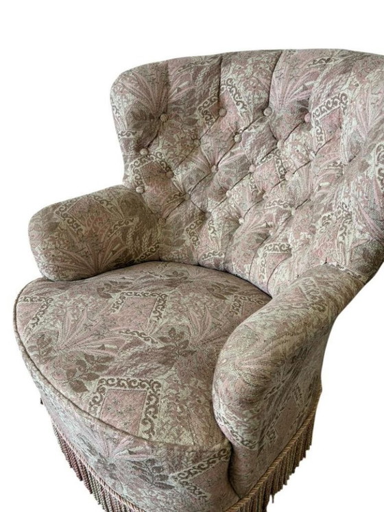 Image 1 of Fauteuil vintage rose clair à motifs floraux / une place avec franges