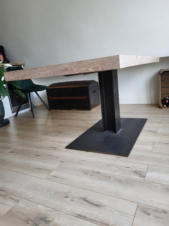 Image 1 of Wooden table with cast iron leg