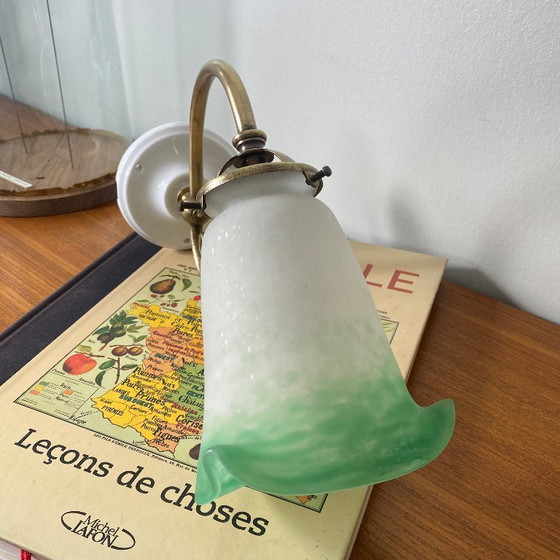 Image 1 of Brass swan-neck wall sconce with a glass paste tulip shade, signed Rethondes