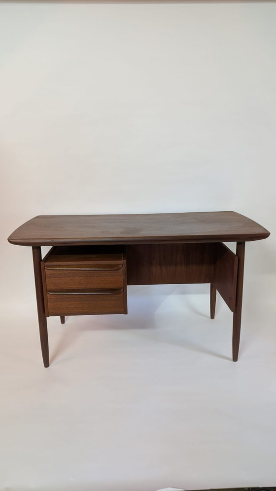 Image 1 of Iconic Mid-Century Teak Desk by Tijseling for Hulmefa made in the 1950s.