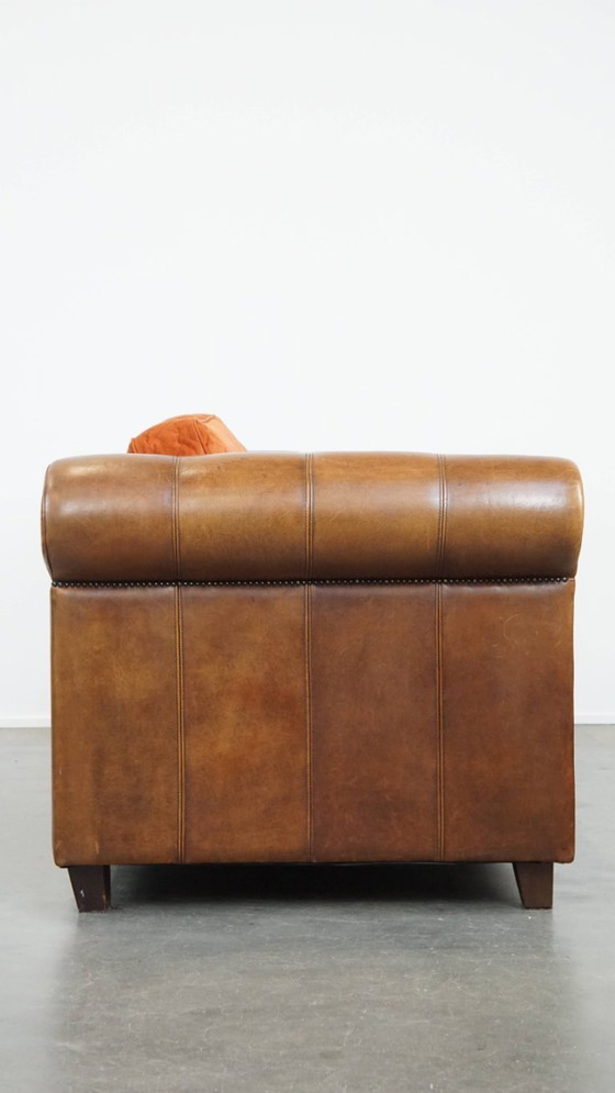 Image 1 of Divano in pelle di pecora da 2,5 posti di alta qualità con cuscini di seduta e schienale in tessuto arancione