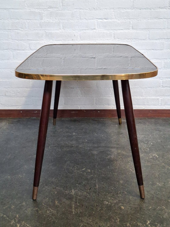 Image 1 of Tavolino da caffè vintage con piano in vetro e gambe inclinate