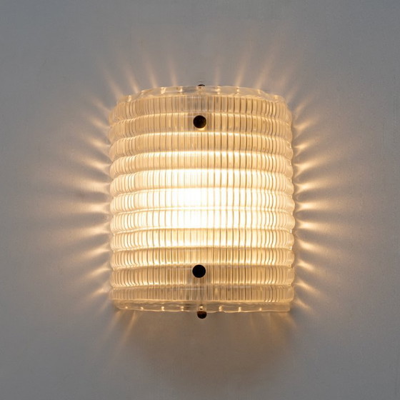 Image 1 of Set van twee wandlampen van Murano-glas met geribbelde textuur.