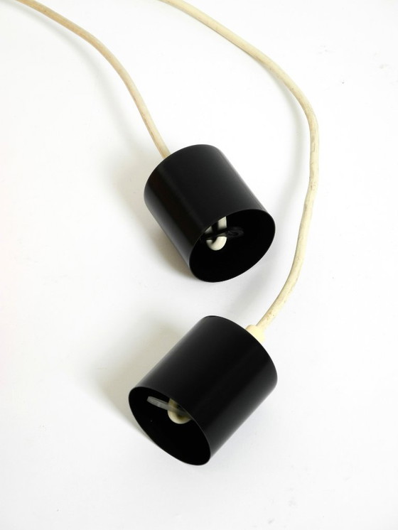 Image 1 of Two rare mid-century tube pendant lamps consisting of two screwed-together copper bowls