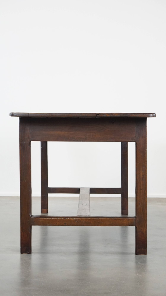 Image 1 of Antique early 19th century French dining table made of oak with 1 drawer