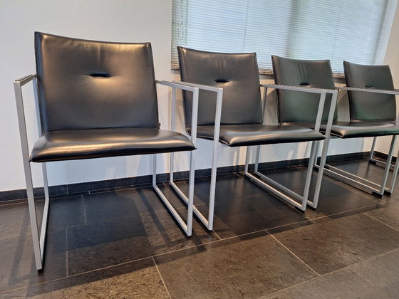 Image 1 of Zwart lederen Arco Frame eetkamerstoelen