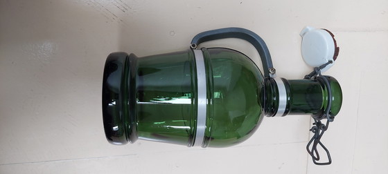 Image 1 of Bouteille ancienne Gerrix à bouchon basculant avec poignée, verre vert