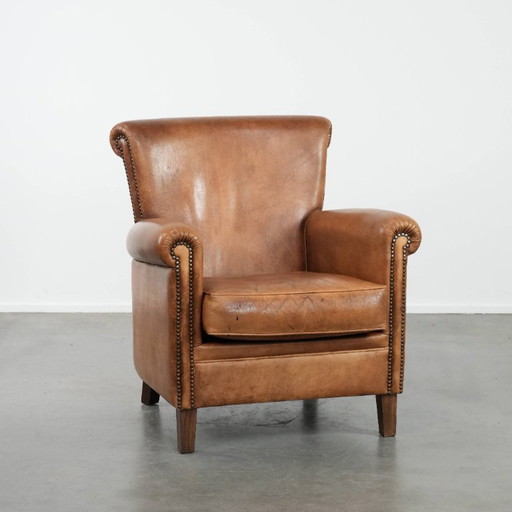 Poltrona vintage in pelle di pecora con carattere