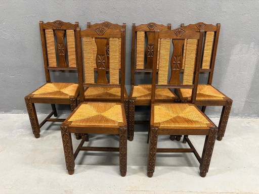 Set van 6 eetkamerstoelen, brutalistische stijl, zitting van riet en essenhout, jaren 1950, Frankrijk