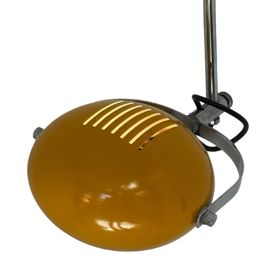 Image 1 of Herda - Lampada da parete spaziale - Paralume giallo, base nera e montante cromato (modello raro)