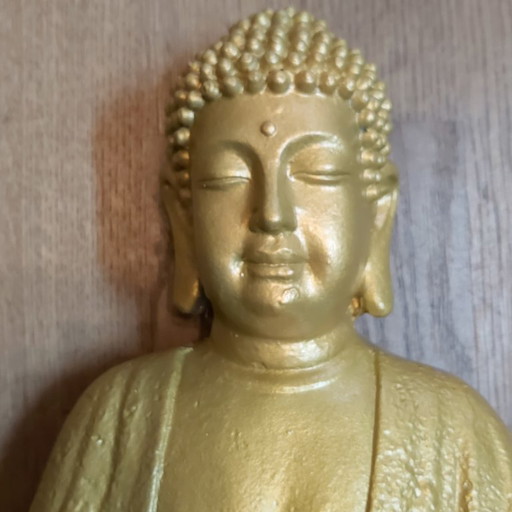Buddha golden in resin