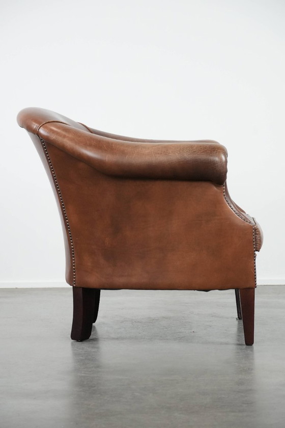 Image 1 of cognac kleurige vintage rundleren clubfauteuil in Engelse stijl 
