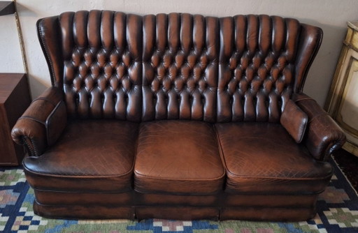 Divano Chesterfield a 3 posti in pelle color castagna