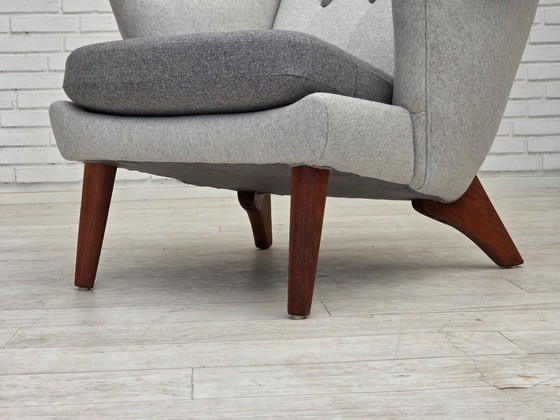 Image 1 of 1970er Jahre, dänischer Sessel mit hoher Rückenlehne und Hocker, Wolle, Teakholz.