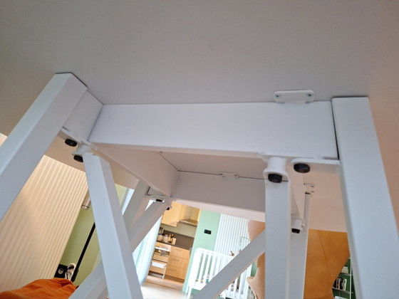 Image 1 of Round white table