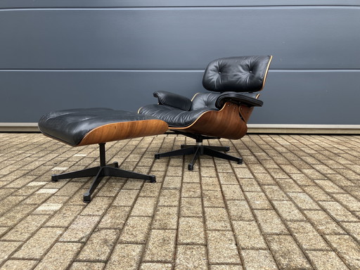 Sillón Eames de Herman Miller by Vitra con otomana. ¡De 1983 con factura! Rio Palissander