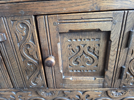 Antique sideboard with beautiful wood carving