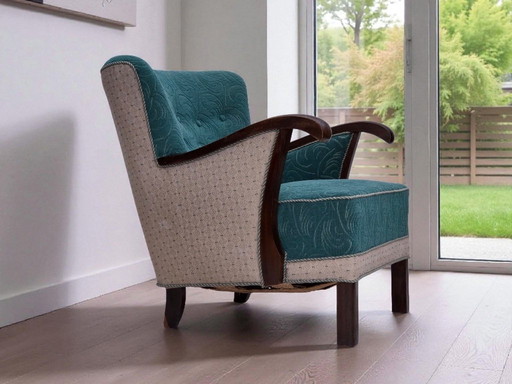 Sillón danés de los años 50, tapizado original en lana verde/beige, madera de haya.