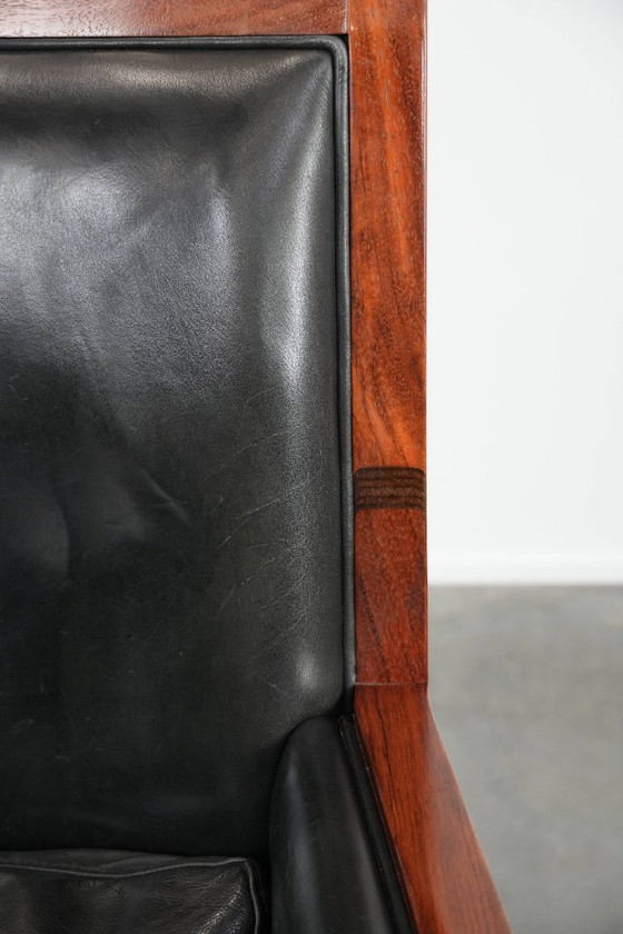 Image 1 of Black cowhide and wooden Art Deco design armchair by Schuitema from the Decoforma series with decorative cushion