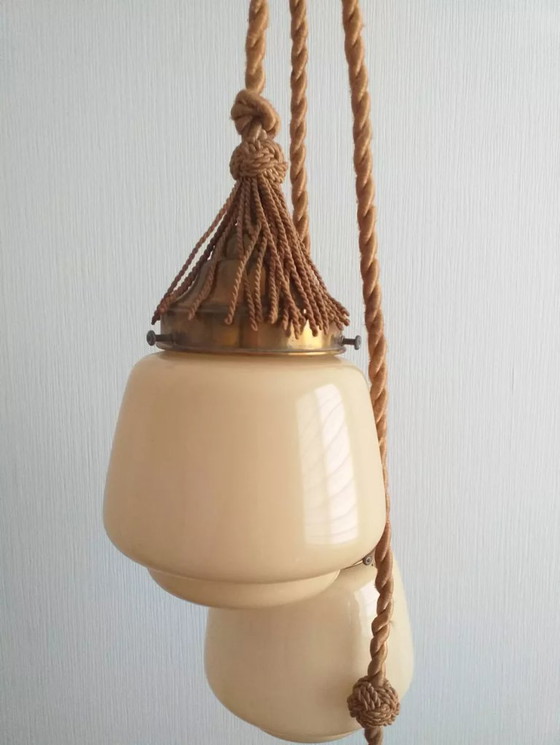 Image 1 of Lampadario Art Déco composto da 3 globi in vetro opalino color miele e passamaneria