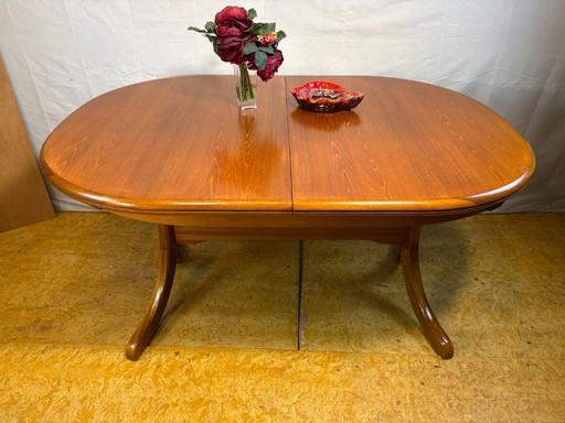 Mid Century Retro Teak Oval Danish Extending Dining Table (Circa 1960–1970)  A stunning mid century modern teak oval extending d