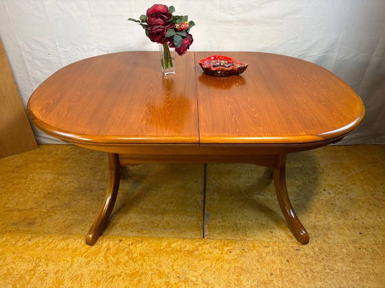 Image 1 of Mid Century Retro Teak Oval Danish Extending Dining Table (Circa 1960–1970)  A stunning mid century modern teak oval extending d