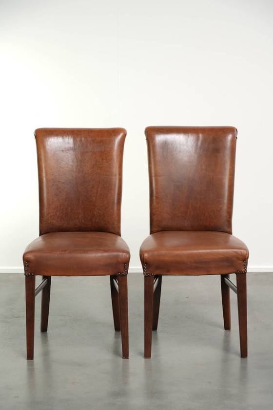 6x Begeerlijke schapenleren eetkamerstoel in een mooie cognac kleur met een mooi patina – Eetkamerstoelen (photo 2 of 17)