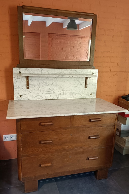 Cassettiera con piano in marmo e specchio